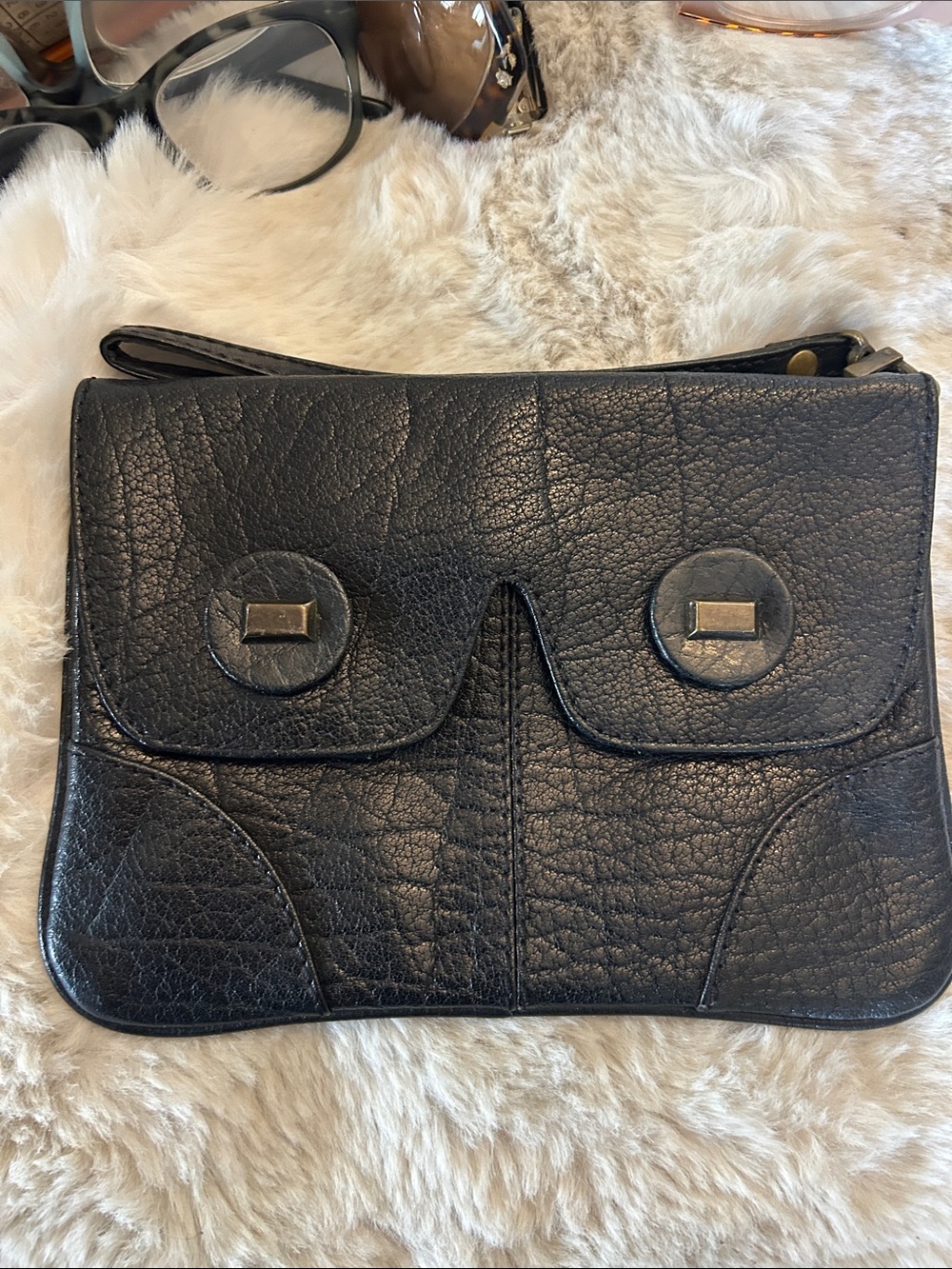 Jigsaw black genuine leather wristlet